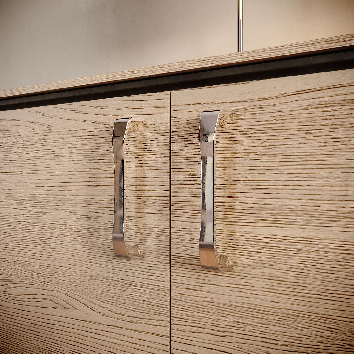 Glossy zamak handles installed on modern wooden furniture